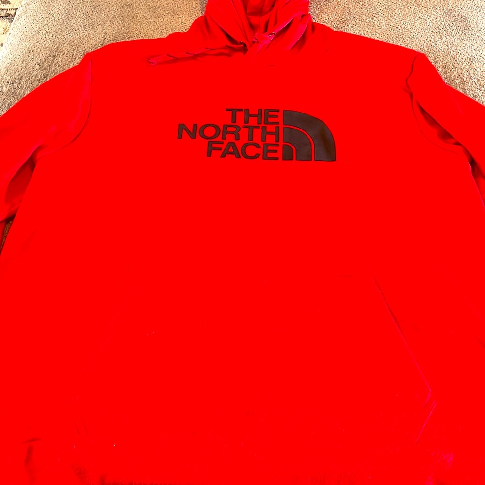 Bright red north face sweatshirt
